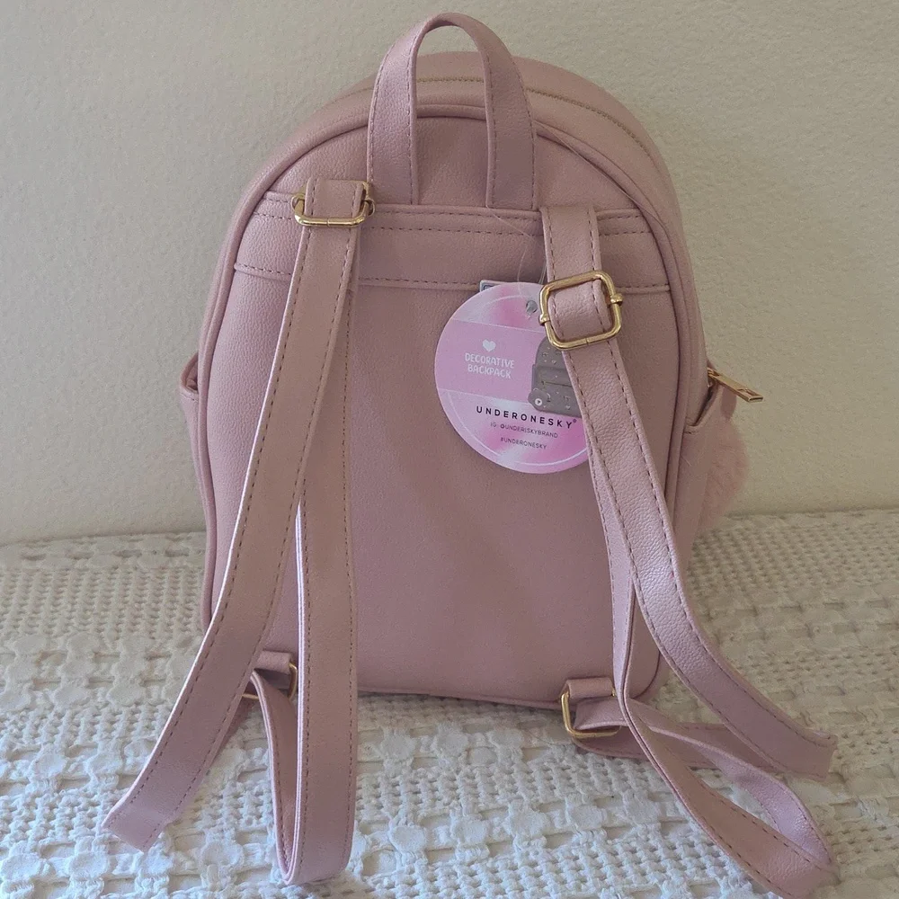Under One Sky Pink Backpack with Teddy Bear Bow Accents and Charm